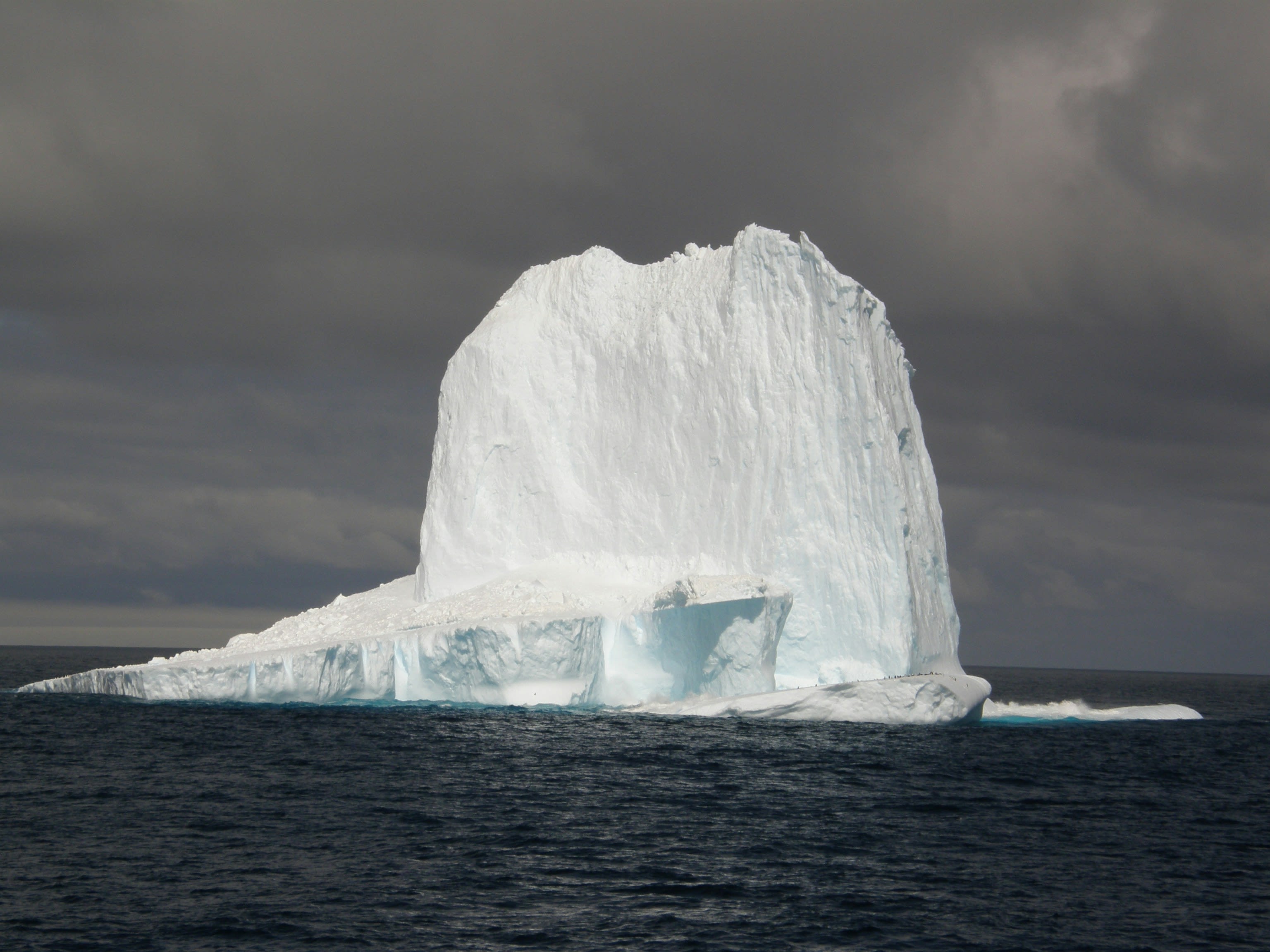 a large iceberg in the water