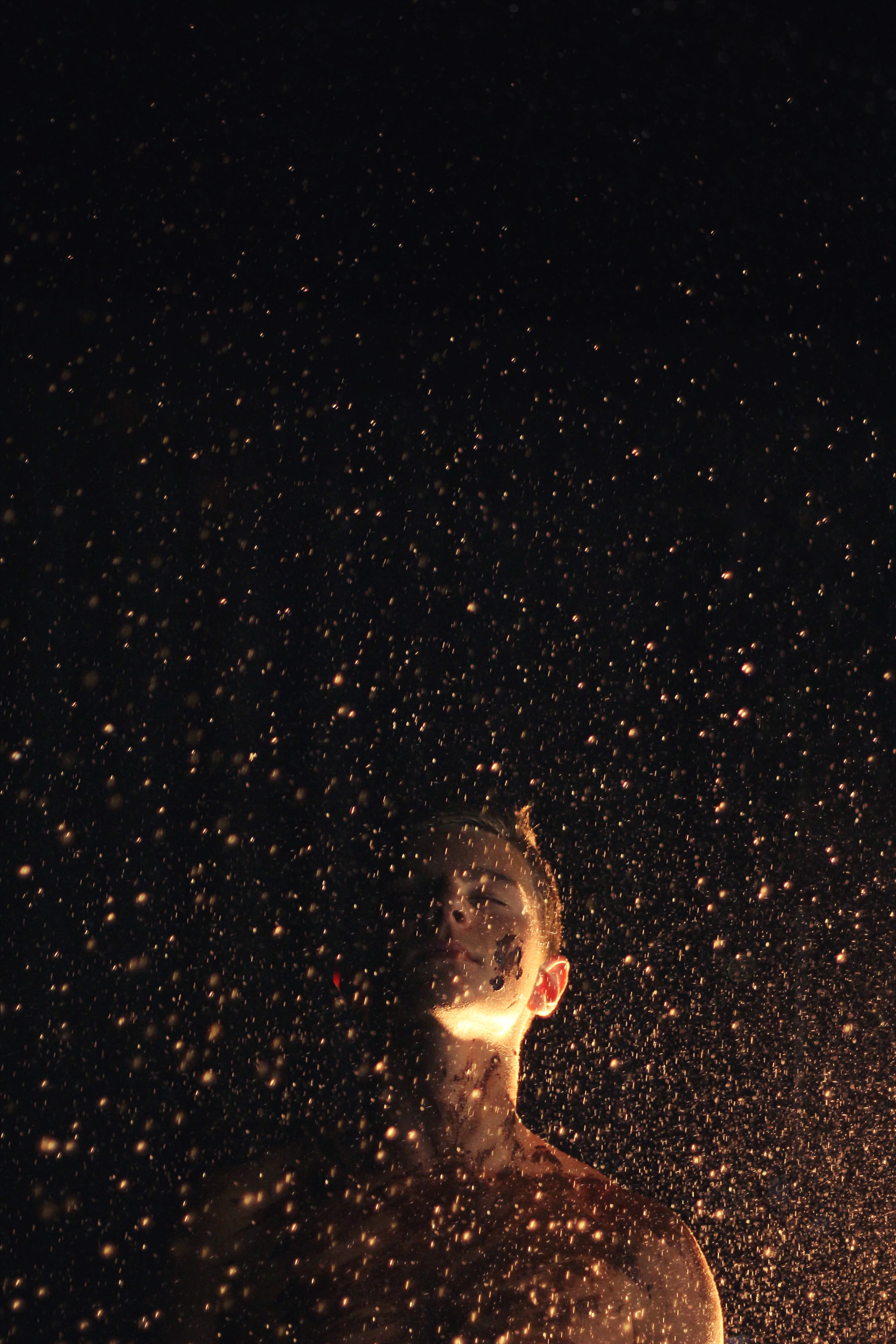 photo of man closing his eyes