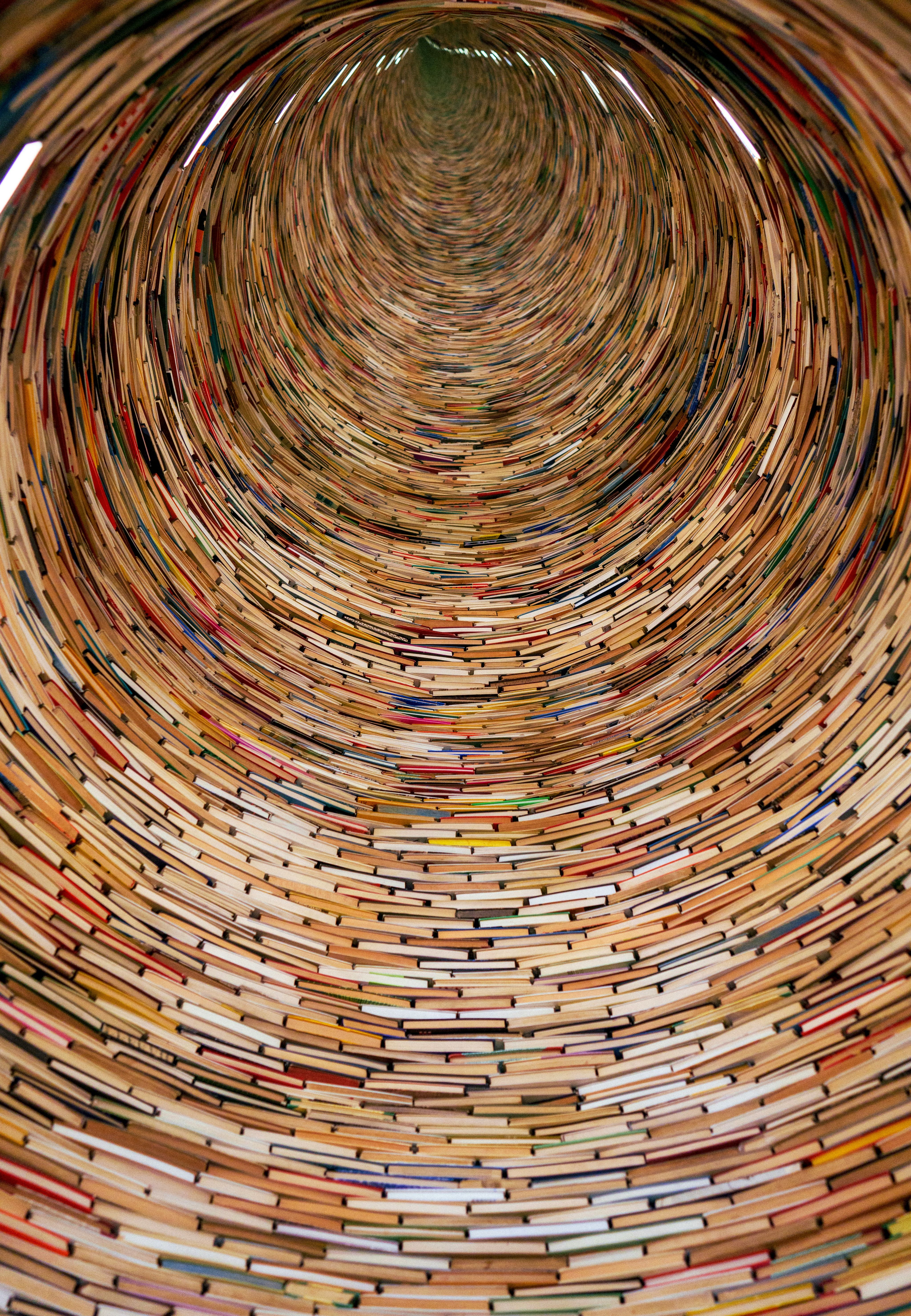 a very large circular object made out of books